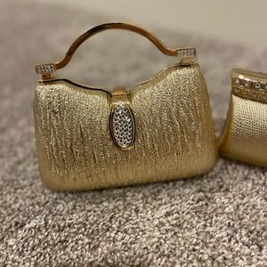 Gold clutch with over the shoulder strap
